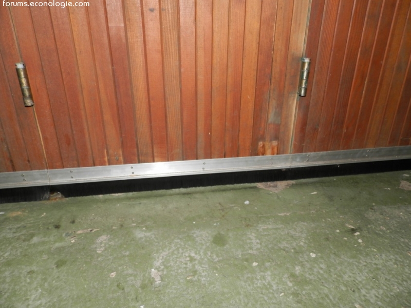 Amelioration isolation porte de garage en bois